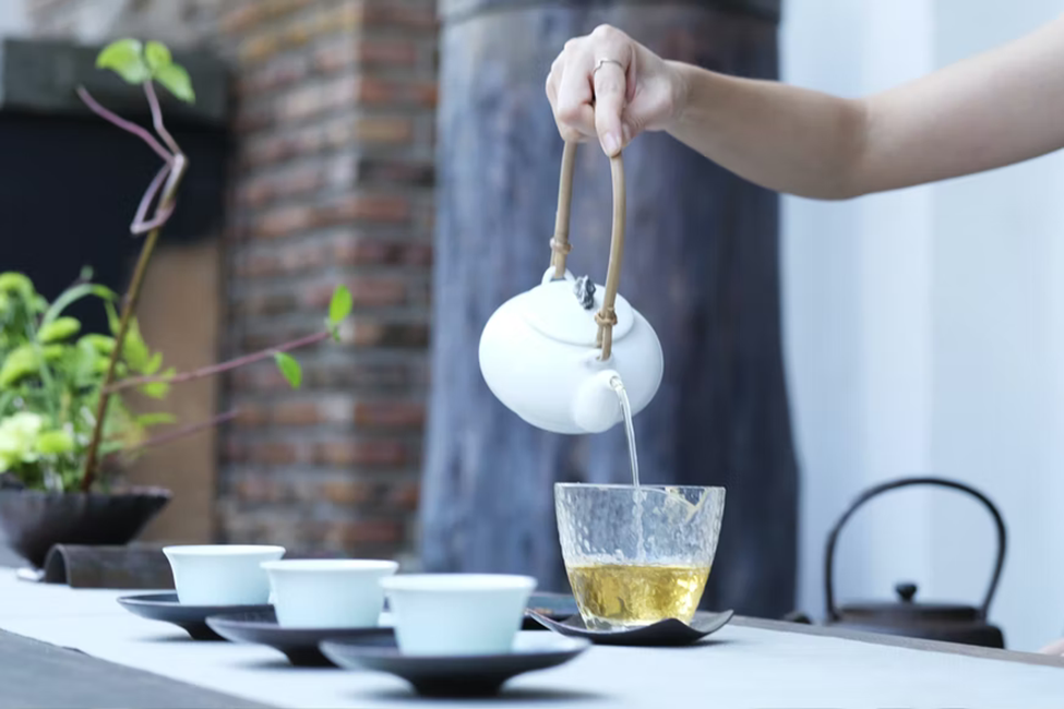 Tea being poured into a cup